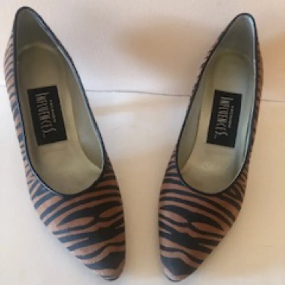 Fashion Influences Leopard print leather high heels. Size: 7.5